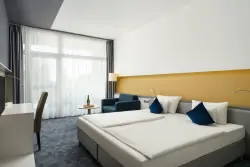 Izba s pohovkou, Hotel Yacht Wellness & Business ****, Siófok, Maďarsko
