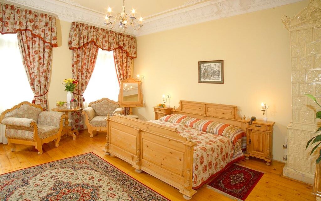 V pokojích hotelu se budete cítit jako v zámecké komnatě