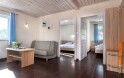 Domček Comfort, Holiday Park Kacze Stawy, Łeba - Nowęcin, Poľsko